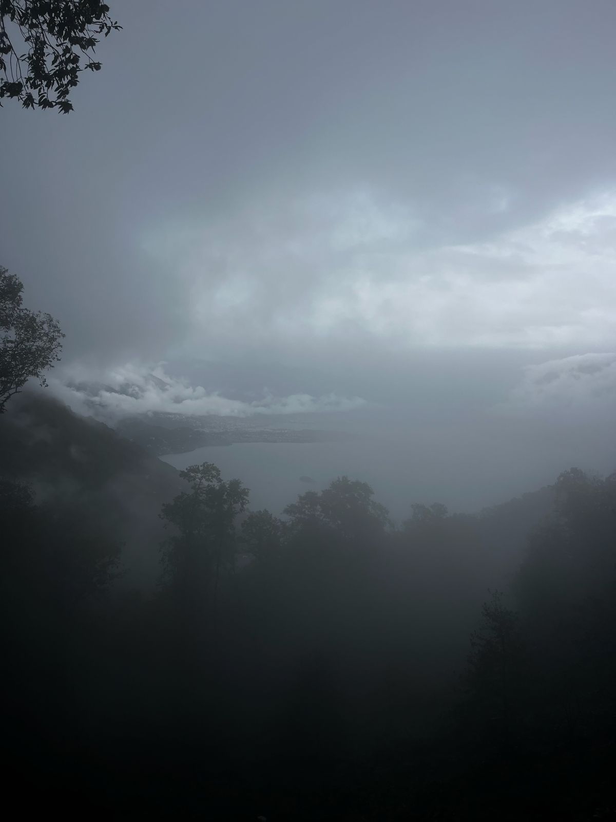 Lake Maggiore barely visible through dense fog