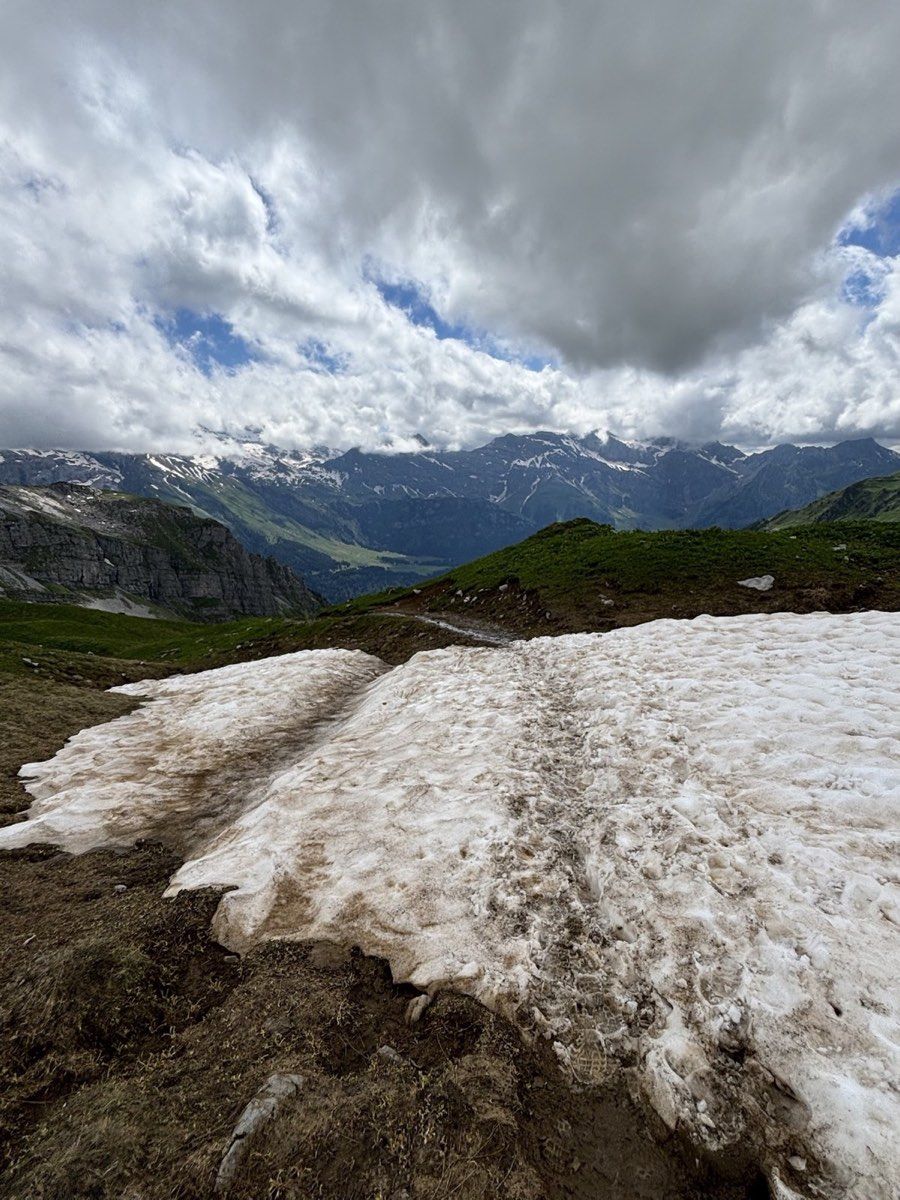 An old snow patch crossing a mountain path near Rugghubelhütte