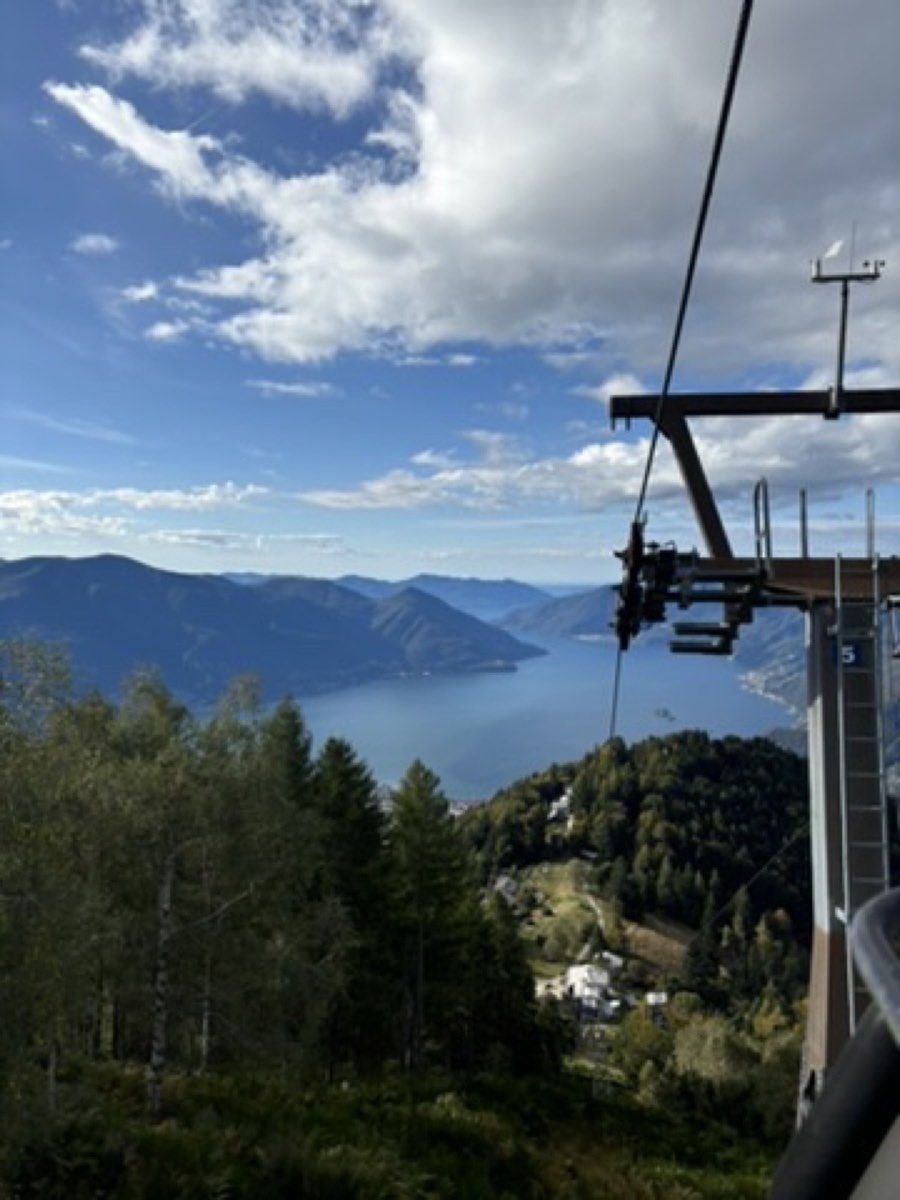 Chairlift above Locarno with a wide lake view