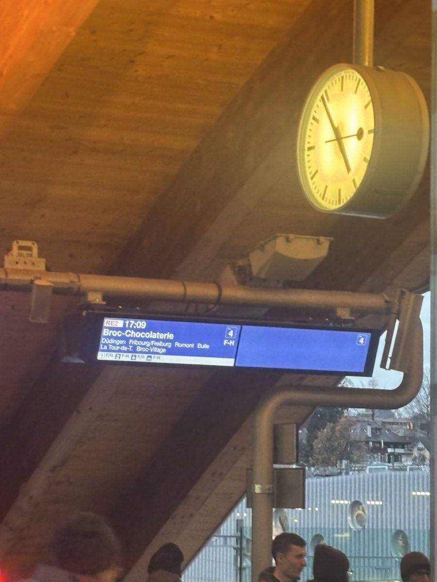 A small station departure display and clock